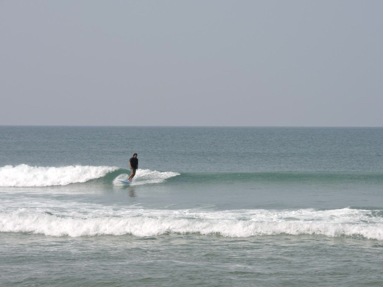 Surfer riding a wave